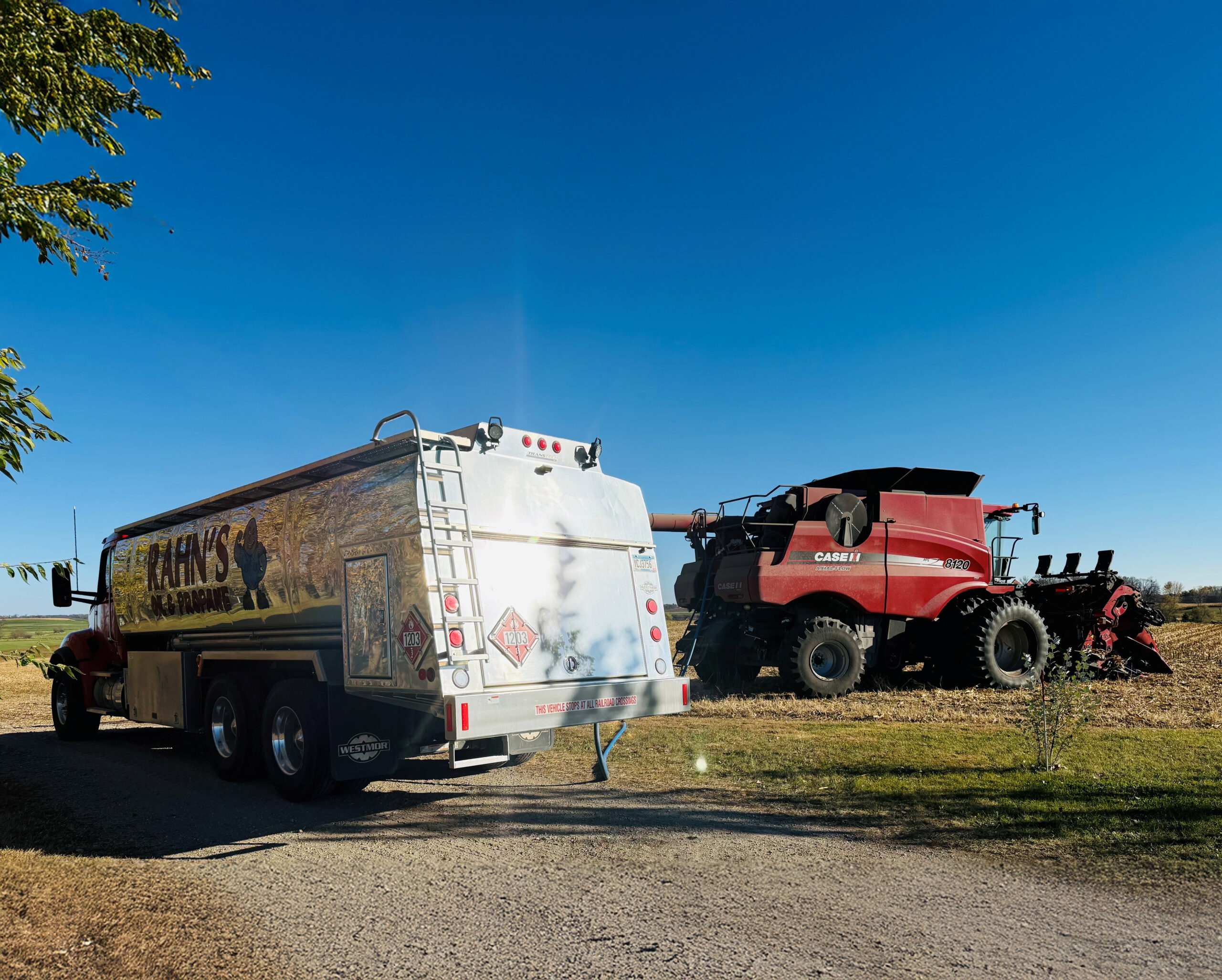 fuel truck and combine in field